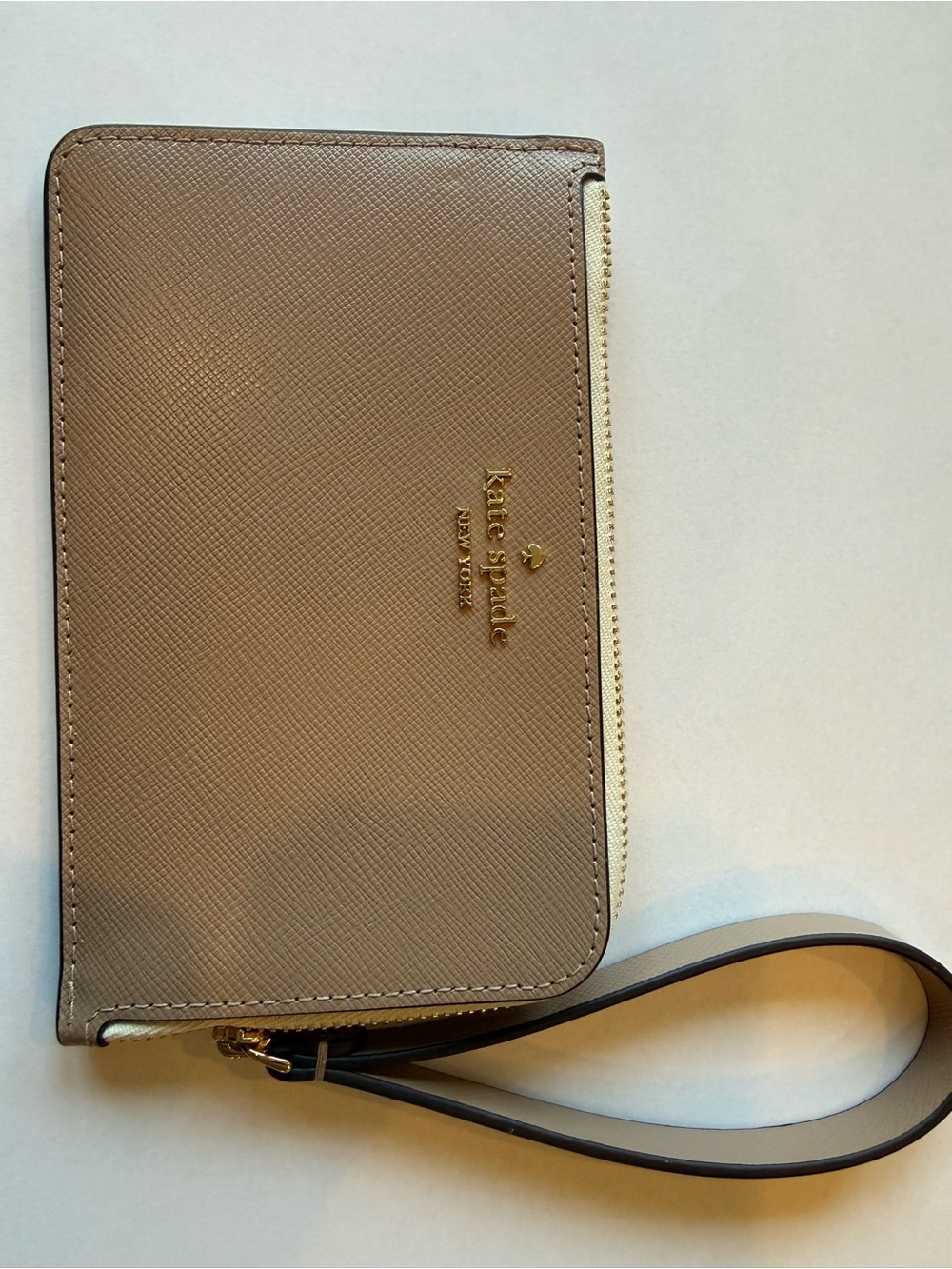 SOLD: Kate Spade taupe and gold zip wristband